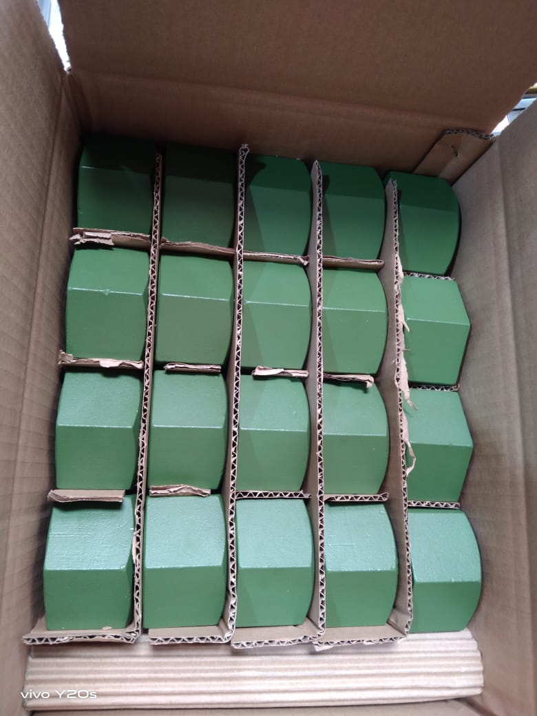 Green PTFE topcoated ASTM A194 2H heavy hex nuts packed in a partitioned carton for export