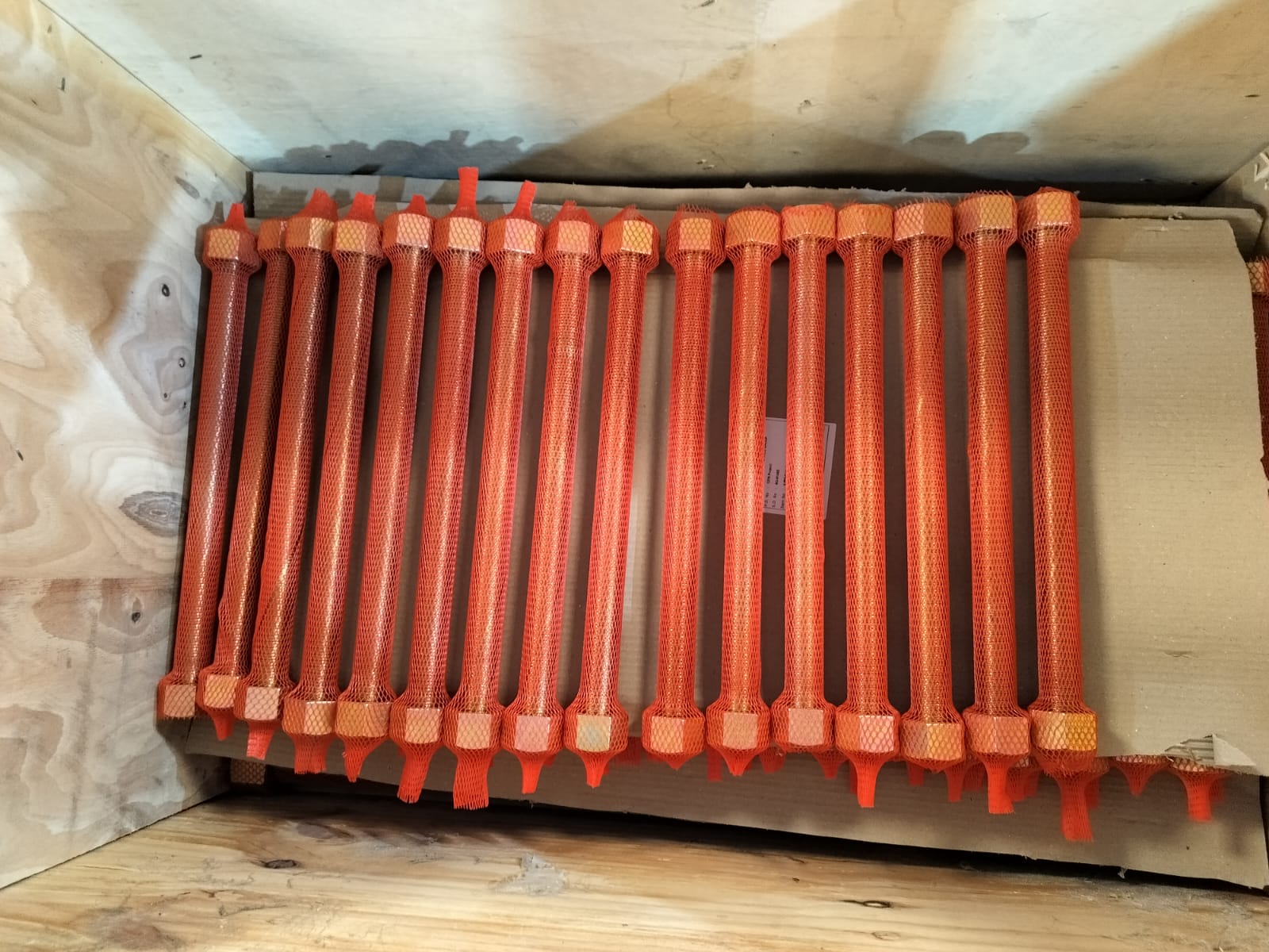 Tagged stud bolts packed in a timber crate for project dispatch