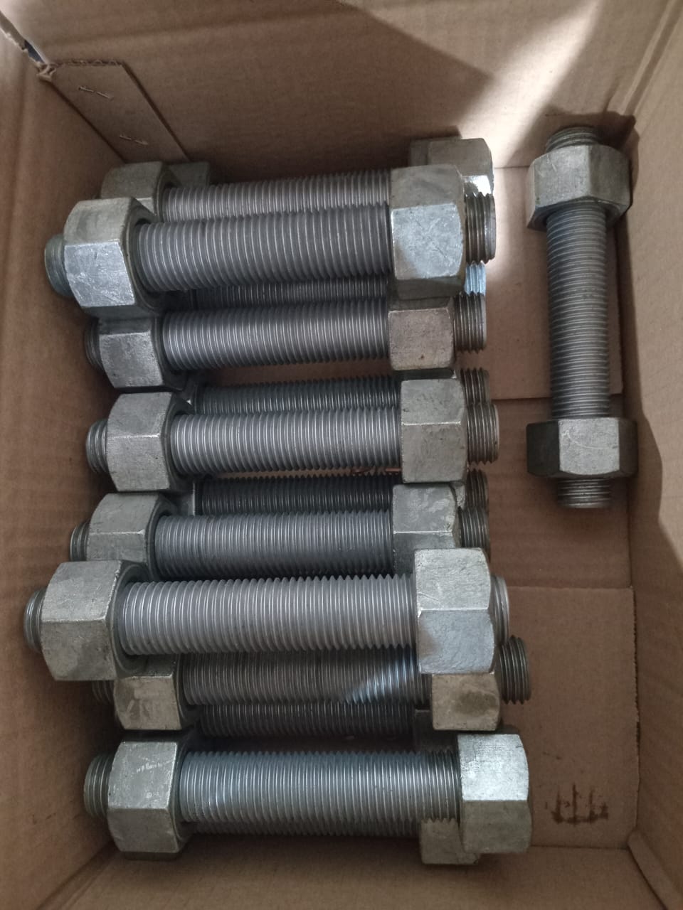 Boxed metric B7/2H stud bolt kits ready for urgent dispatch