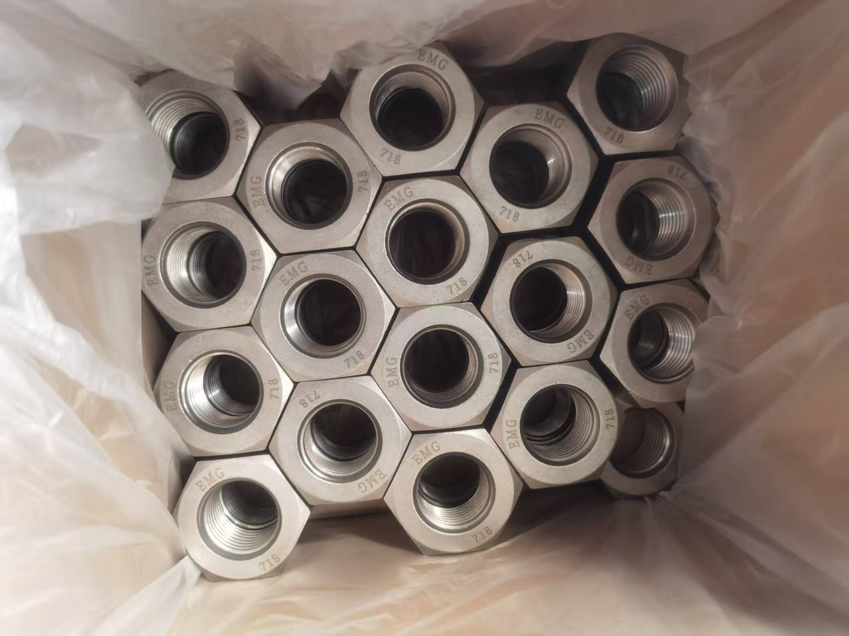 Inconel 718 fasteners showing machined threads and hexagonal heads