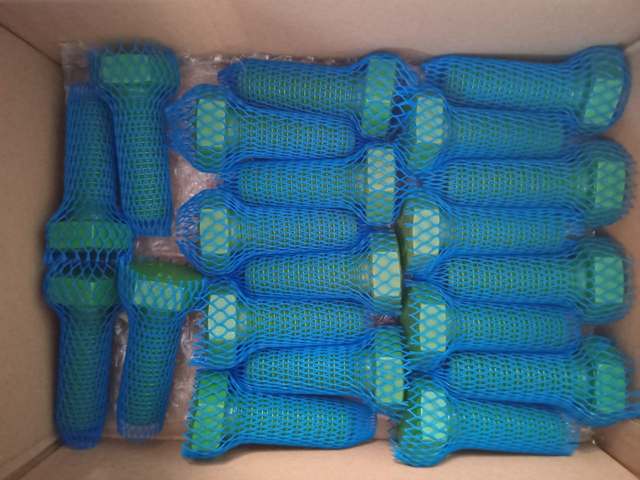 Coated industrial fasteners showing fluoropolymer and zinc coating systems